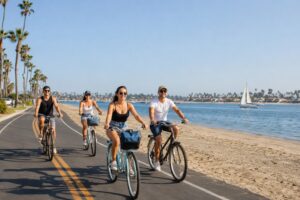 Group activities Mission Bay San Diego with friends riding bikes along the waterfront